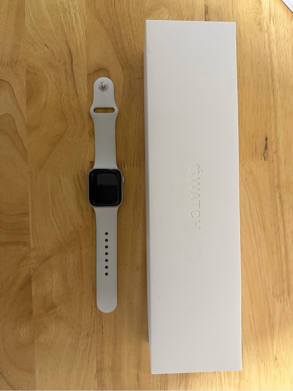 Apple Watch with White Sport Band and Space Gray Case